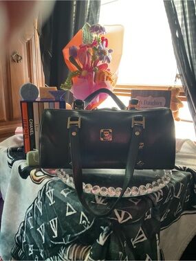 MCM Black Leather Barrel Satchel with Gold Hardware